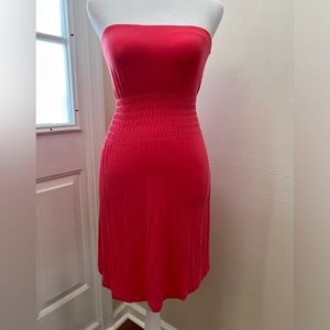 Bebe Strapless Mini Dress in Pink. Size XS